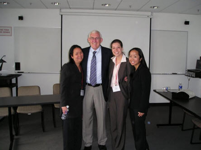photo of Linda with professor and two women