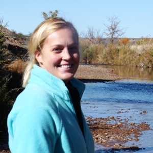 Julia Mueller scouts out field sites at the Pecos River