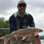 Matt Acre with a Blue Sucker