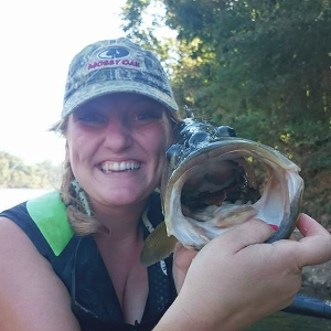 Jessica East shows off a Largemouth Bass